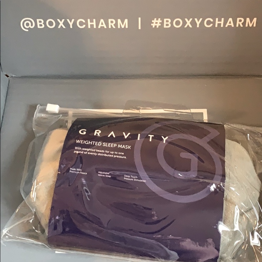 Gravity weighted sleep mask